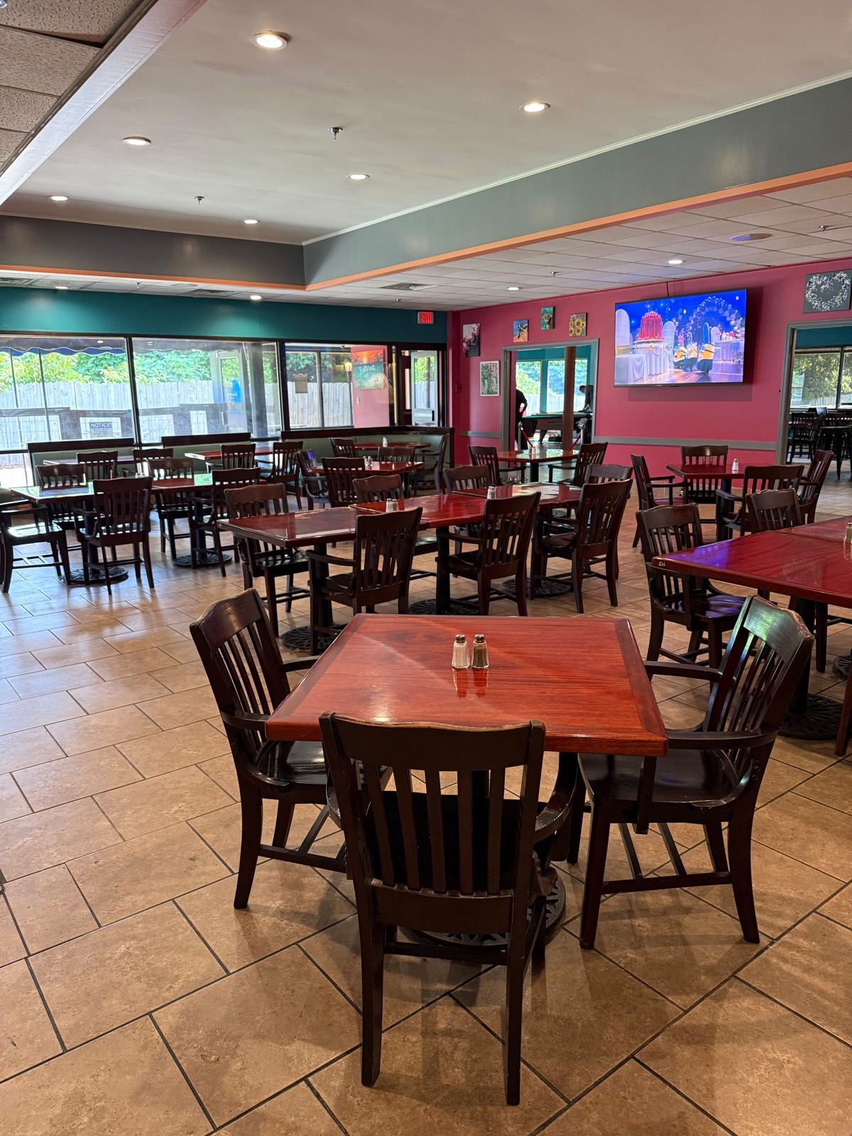 Dining booths and tables at Bottomz Up Bar & Grill