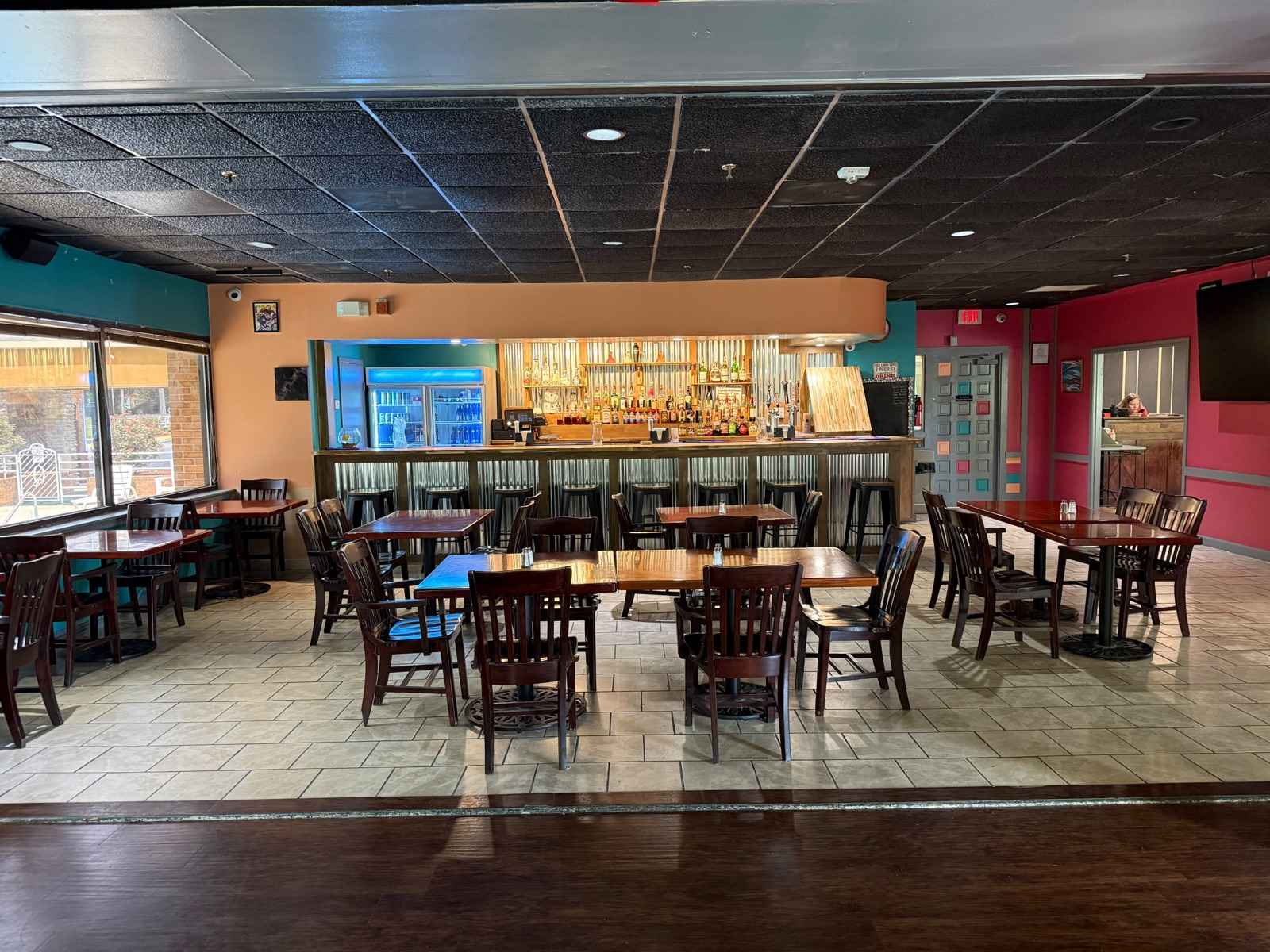 Wide view of dining floor and bar at Bottomz Up