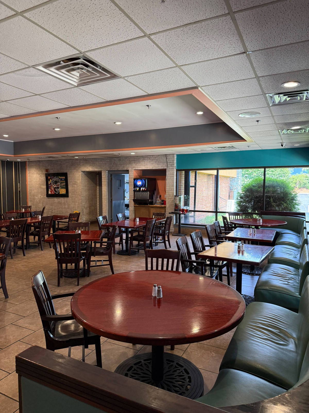 Booth seating and dining room ready for guests